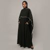 Redefine your modest style with our Black Cape Abaya, a perfect blend of functional design and playful sophistication. This unique piece features a stylish layered cape silhouette, accented with delicate white piping and charming polka-dot sleeves that add a touch of personality to a classic black ensemble. Designed for the modern woman on the go, it seamlessly combines comfort with a high-fashion edge.