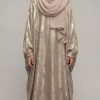 Make your little princess shine at her next special event with our Metallic Gold Abaya Kid. This stunning piece is designed for those moments that require a touch of glamour—whether it’s Eid, a wedding, or a formal family celebration. The fabric catches the light beautifully, ensuring she feels like the star of the show.
