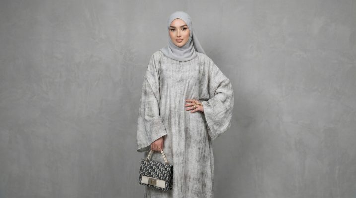 Elevate your modest wardrobe with our Premium Grey Textured Closed Abaya. This piece is the epitome of sophisticated simplicity, designed for the modern woman who values both style and tradition. Crafted from a high-quality, breathable fabric with a unique marble-like texture, this abaya offers a graceful drape and effortless silhouette.