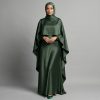 Make a regal statement with our Emerald Satin Cape Abaya. This piece is the definition of luxury, combining a deep, jewel-toned green with the liquid-like sheen of premium satin. The unique cape design adds a layer of sophisticated drama, making it the perfect ensemble for grand weddings, formal galas, and VIP celebrations.