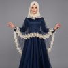 Step into elegance with our Midnight Navy Cape Abaya, a stunning piece designed for those who love a touch of vintage glamour. This abaya features a unique tiered cape design made of delicate sheer mesh, adorned with exquisite cream floral lace. The contrast between the deep navy satin-finish base and the soft lace details creates a balanced, sophisticated look perfect for special celebrations.