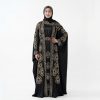 Make a grand entrance with our Golden Calligraphy Butterfly Abaya. This exquisite piece is a tribute to Islamic art, featuring stunning gold-thread embroidery that combines traditional Arabic calligraphy with intricate geometric star motifs. The "Farasha" (butterfly) silhouette offers a regal, flowing drape that is both modest and undeniably powerful.