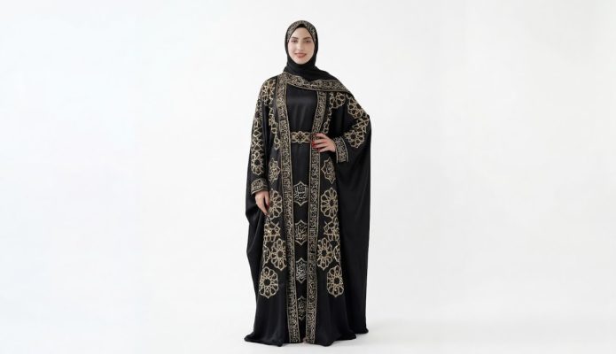 Make a grand entrance with our Golden Calligraphy Butterfly Abaya. This exquisite piece is a tribute to Islamic art, featuring stunning gold-thread embroidery that combines traditional Arabic calligraphy with intricate geometric star motifs. The "Farasha" (butterfly) silhouette offers a regal, flowing drape that is both modest and undeniably powerful.