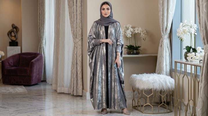 Step into the spotlight with our Butterfly Abaya, a masterpiece of modest luxury. This abaya features the iconic "Farasha" (butterfly) cut, offering an oversized, flowing silhouette that exudes grace and authority. Covered in a shimmering silver metallic finish, it’s the ultimate statement piece for high-end events and evening celebrations.